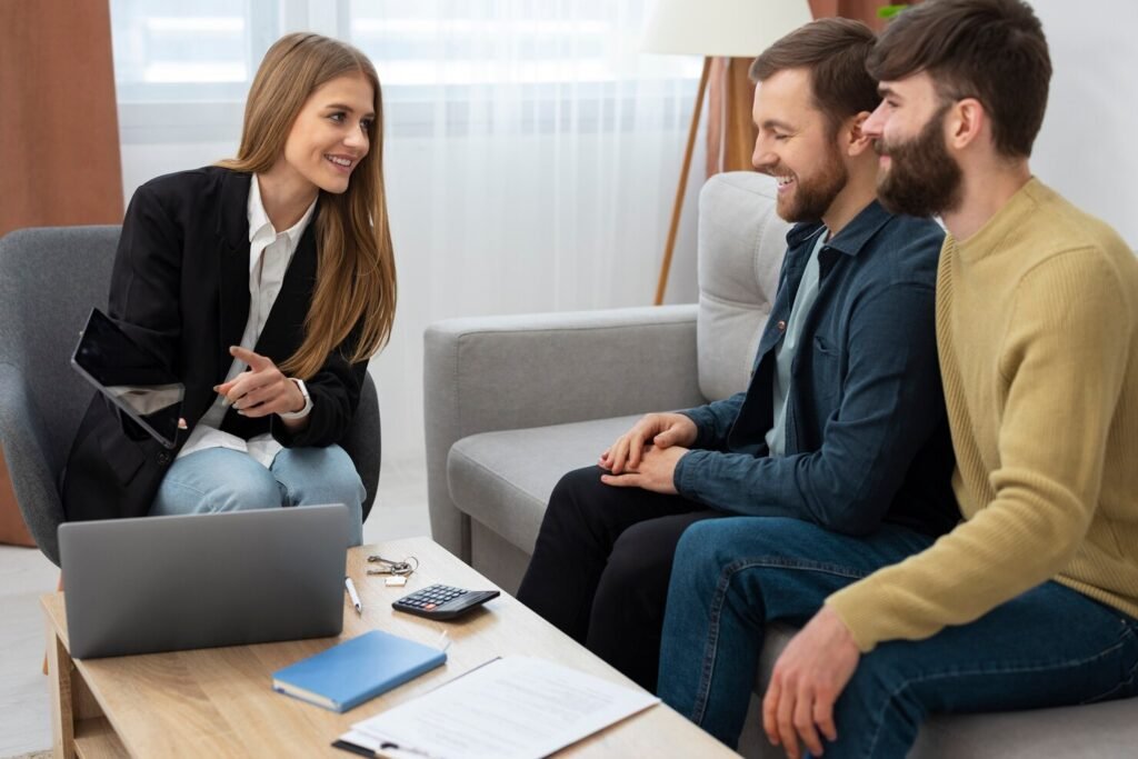 female-real-estate-agent-talking-business-showing-house-gay-couple_23-2150164738.jpg